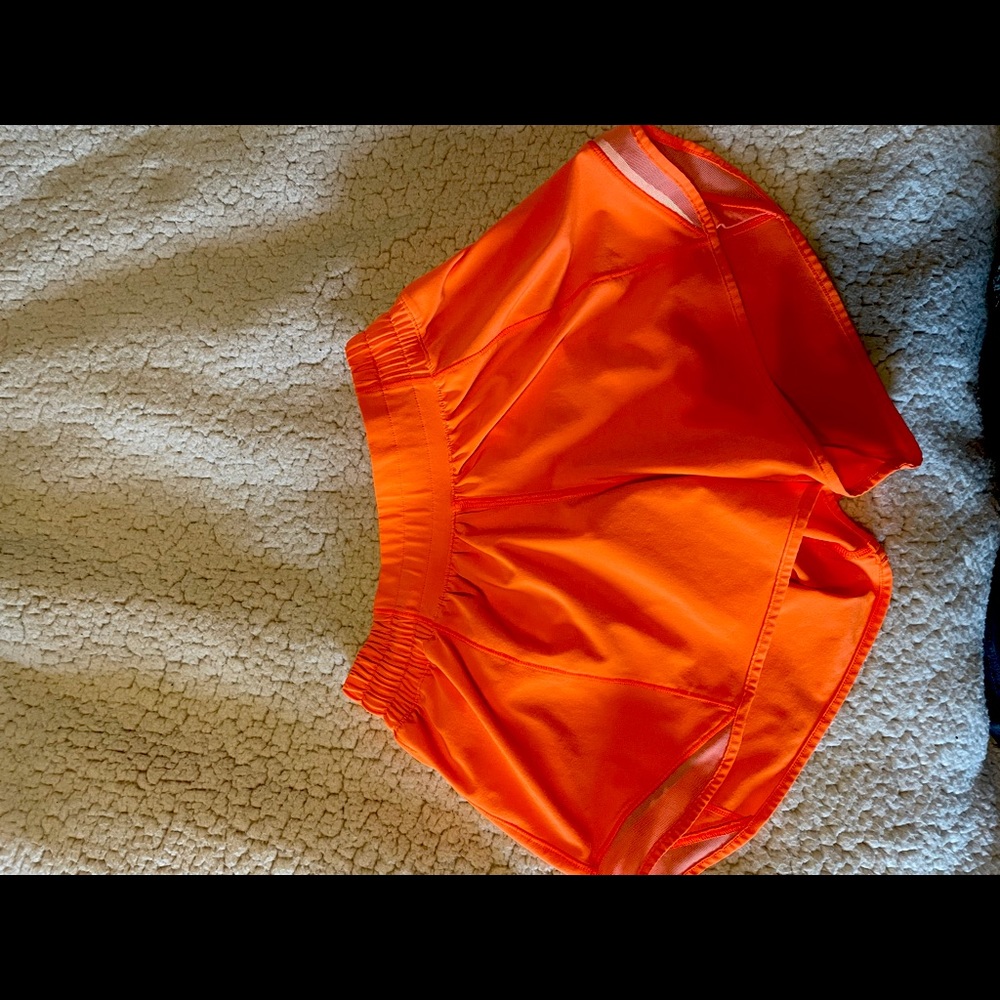 Neon orange Lululemon shorts